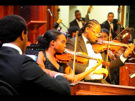 A small section of the 40-member strong Philharmonic Orchestra of Jamaica.