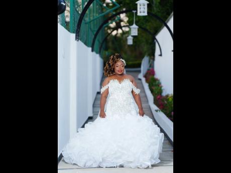 Corazan's first wedding dress, created by REbirth Couture.