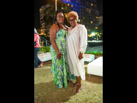 Suzette Brown (right), managing director, Mediasol, and Suzette Black, Sagicor Bank Fairview branch manager, are happy to be at Cocktails on the Coast.