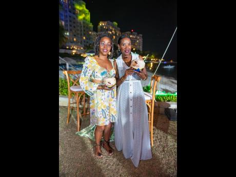 Tanya Martin (left), reservations manager at Lucky Bastard Fishing Charter, and Viviene Junagadala, owner of Tropics Apparel, were dressed in breezy summer essentials.