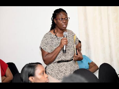 Barbara James, guidance counsellor of Cumberland High School, speaks at the Child Protection and Family Services Agency’s Ananda Alert Youth Forum at Altamont Court hotel in New Kingston yesterday.