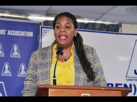 Jamaica Teachers’ Association (JTA) President La Sonja Harrison speaking about the salary compensation package during a press conference at the JTA head office in Kingston on Monday.