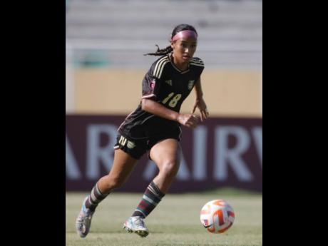 Jamaica’s Amelia van Zanten in action against Canada during yesterday’s Concacaf Under-20 Women’s Championship game at the Estadio Felix Sanchez in the Dominican Republic. Canada won 4-0. 