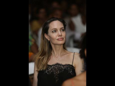Actress Angelina Jolie sat in the audience during open mic on Saturday night. 