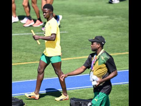 Ackeem Blake (left) and coach Gregory Little at a training session held at Lane Community College in Eugene, Oregon during last year’s World Athletics Championships. 