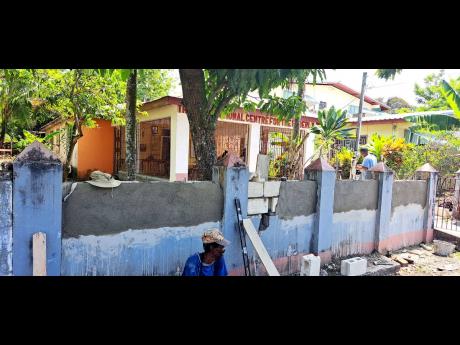 A perimeter wall under construction at the senior citizens recreational centre in Buff Bay, Portland.