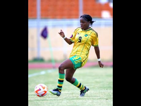 Jamaica’s Natoya Atkinson in action against the United States during their  Concacaf Under-20 Women’s Championship game at the Estadio Felix Sanchez in the Dominican Republic on Sunday. The United States won 4-0.