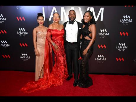 Hosts for the evening dazzle on the red carpet. From left: Anika Crawford, digital transformation lead at the VM Group; entrepreneur Cecile Levee; broadcaster Archibald Gordon, and Shaquille Hines, senior communications and change officer, VM Group.