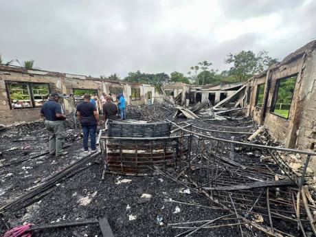 The burned dormitory of a secondary school in Mahdia, Guyana on May 22. 