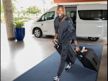 World 200 metres champion Noah Lyles of the United States arrives at The Jamaica Pegasus hotel yesterday. Lyles is here to compete at  tomorrow’s Racers Grand Prix at the National Stadium.