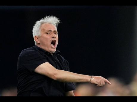 Roma’s head coach Jose Mourinho shouts during the Europa League final between Roma and Sevilla at the Puskas Arena stadium in Budapest, Hungary on Wednesday, May 31, 2023.