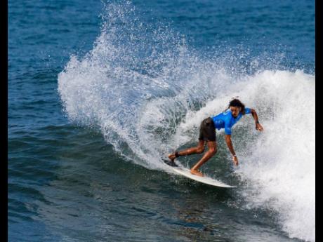 Jamaica’s Elishama Beckford tries to make the best of the waves at El Sunzal on day three of the ISA World Surfing Games in El Salvador yesterday. 