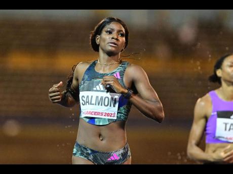 Shiann Salmon eases after capturing the women's 400 metres hurdles at the Racers' Grand Prix at the National Stadium this evening.