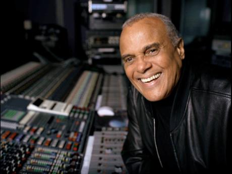 
Actor and singer Harry Belafonte poses for a portrait at a New York recording studio, in November 2001. 
