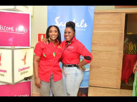 Aldria Grant, administrative consultant, Downsound Entertainment (left)  and Danielia McLean, project manager, Magnum Tonic Wine, were all smiles at the Reggae Sumfest Media Launch.