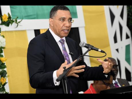 Prime Minister Andrew Holness addressing a meeting of the National Disaster Risk Management Council at the Spanish Court Hotel in New Kingston last Thursday.
