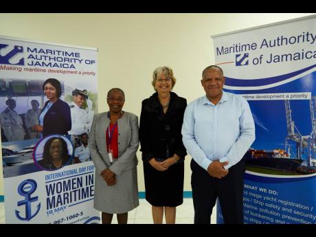Deputy Director General of the MAJ, Claudia Grant (left,) with Chair of Jamaica’s Trade Facilitation Task Force Pat Francis and Captain Steven Spence, director in the Directorate of Safety, Environment and Certification, MAJ, at an event to celebrate Int