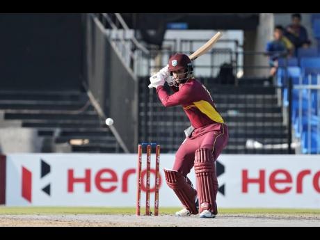 West Indies opener Brandon King winds up to play a shot during an innings of 64 in a ONe-Day International against the United Arab Emirates in Sharjah yesterday. 