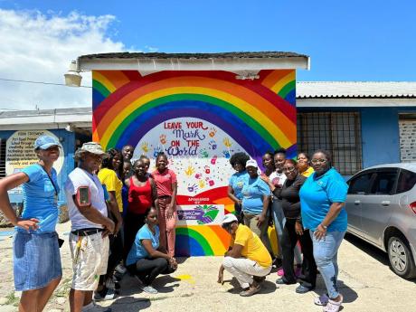 The Student Loan Bureau’s (SLB) Corporate Social Responsibility team decided to take what could have been a dreary task up a notch by painting a mural at Port Royal Primary and Infant School on Labour Day. ‘Leave Your Mark on the World’ was a most-ap