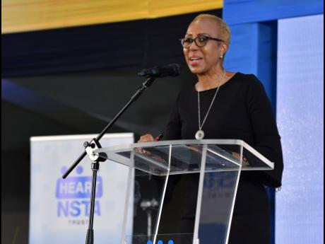 Minister of Education and Youth Fayval Williams addresses the recent WorldSkills National and Junior Skills Competition, held at the National Arena in St Andrew.