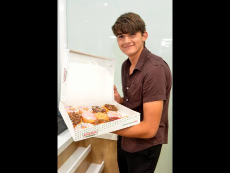 Giovanni Lehman showed up to get his fill of the Krispy Kreme variety box.