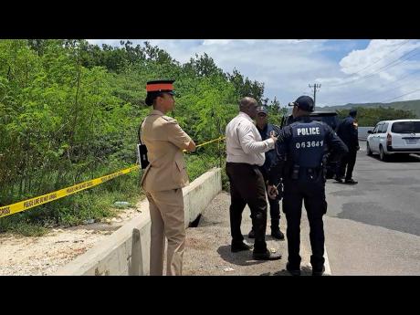 Police personnel take part in yesterday’s operation on Hellshire, St Catherine. 