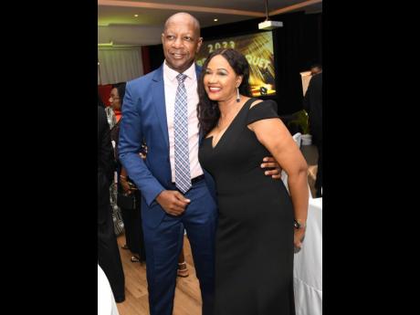 Pete Smith, director of C&WJ Co-operative Credit Union, poses with Bethune Lugg-Banton, general manager of QNet, at the Jamaica Co-operative Credit Union League 2023 Convention and Awards Banquet.