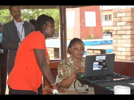 Stephen Rodriques observing voter registration in Liberia