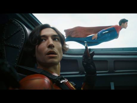 Ezra Miller (left), and Sasha Calle in a scene from ‘The Flash’.