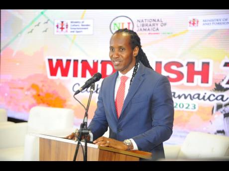 Alando Terrelonge, state minister in the Ministry of Culture, Gender, Entertainment and Sport, addresses the attendees at the ‘Windrush 75 Reflections from Kingston Harbour’ panel discussion at the MFAFT headquarter recently.