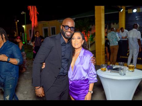 Designer Mark Anthony (left) and Red Stripe’s Head of Corporate Affairs Dianne Ashton-Smith as he celebrated the launch of his genuine leather accessories collection.