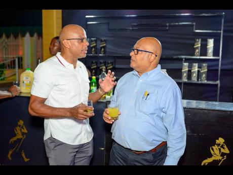 Chairman at iPrint Digital, Steven Steele (left), and Richard Reese,  managing director at Allied Protection Limited, stopped for a quick chat at the Johnnie Walker bar.