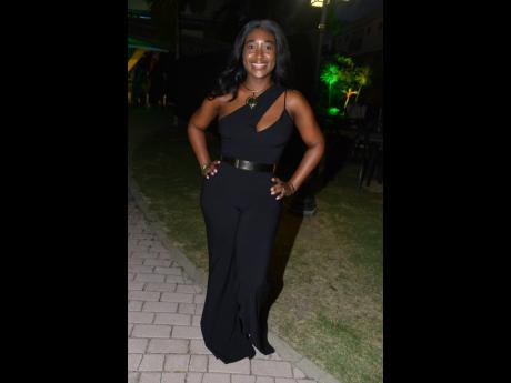 Attorney-at-law Lecia-Gaye Taylor wows in a form-fitting black jumpsuit. 