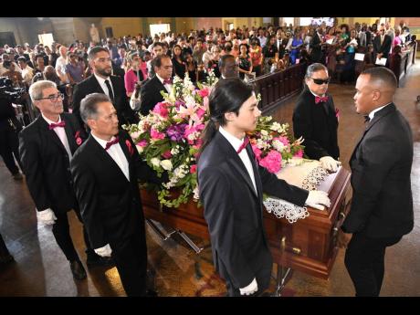 Pallbearers (from front left) Pedro Gonzalez Sanchez, Neil Chin, and Richard Chin (son), Najere Weir, with a representative Roman’s Funeral Home, as well as (from back row left) Scott Roman, Roman’s Funeral Home director, Joel Gonzalez, Dr Lorenzo Gord
