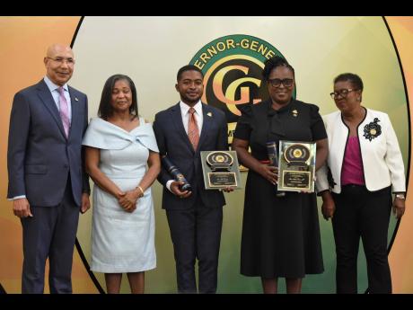 From left: Governor General Sir Patrick Allen; Lady Allen; Ajaé Clacken and Alethia Peart, recipients of the Governor General’s Achievement Awards 2023; and Beryl Rochester, custos of St Elizabeth, in a celebratory photo at the Governor General’s Achi