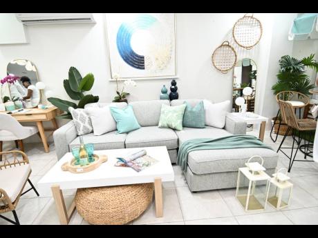 From teal throw pillows to wall art and trays, Spaces invites you to refresh your home for this summer season. 