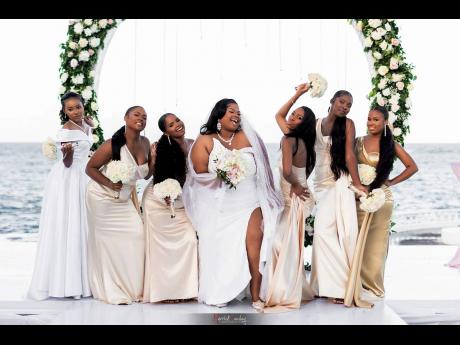 She’s a wife! This beautiful bride’s wedding day is definitely better with her supportive bridesmaids.