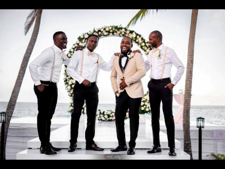 The groom went from a man to a husband and he could not be happier to have his groomsmen by his side. 