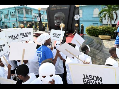 File photo shows children marching on Church Street as the Child Protection and Family Services Agency (CPFSA) staged its ‘Stop the Silence, End the Violence islandwide children’s march and remembrance rally from St William Grant Park to Secret Gardens