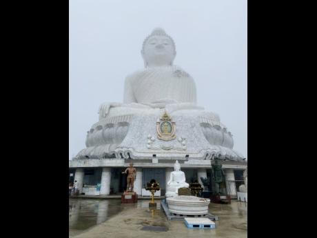 On a cloudy day, the Big Buddha, Phuket, shun bright in all of its glory.