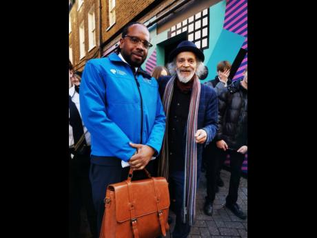 Rohan Cruise (left) shares the spotlight with renowned Caribbean poet, John Agard.