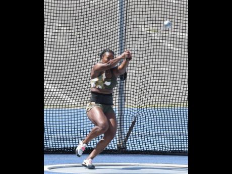 Nayoka Clunis in action during the women's hammer throw at the JAAA/PUMA National Senior and Junior Championships inside the National Stadium this morning.