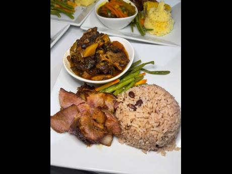 Oxtail anyone? Paired with traditional rice and peas, the dish is complete with steamed vegetables and ham.