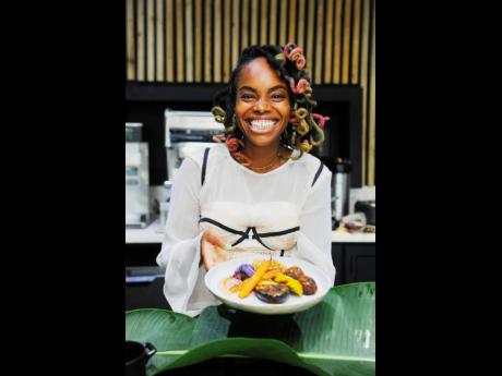 Serving up her famous babe bowl, The Plantry Queen Danielle Terrelonge is all smiles. 