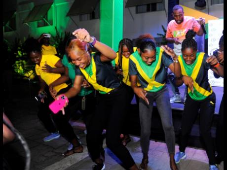 The Sunshine Girls dancing to the hit song ‘Drift’ at their send-off party at the Summit House (formerly Knutsford Court Hotel), on Ruthven Road in New Kingston on Tuesday night.