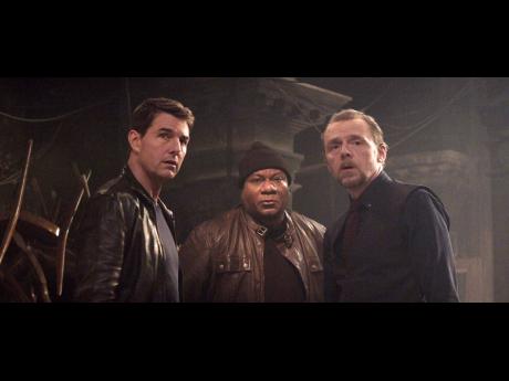 This image released by Paramount Pictures shows (from left) Tom Cruise, Ving Rhames and Simon Pegg in a scene from ‘Mission: Impossible – Dead Reckoning, Part One’. 