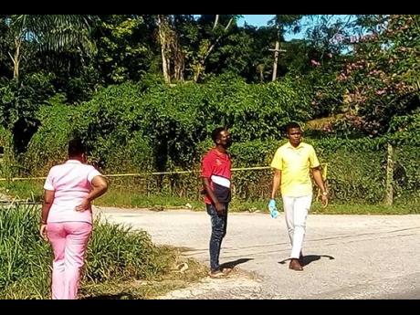 File photo shows Scene of Crime detectives carrying out investigations in the area where the body of nine-year-old Gabriel King was found in St James. 