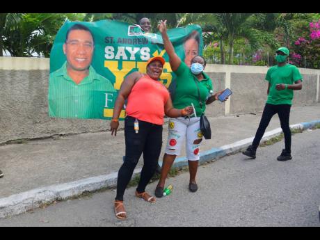 
PNP and JLP supporters pose for a photo on August Town Road in this September 2020 photo.