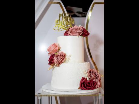The Murrays’ wedding cake was made with love by Shadae Whyte of The Sweet EsCake Ja