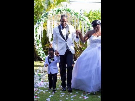 The stunning newly-weds were happy to celebrate nuptial bliss with their son, Zayne.